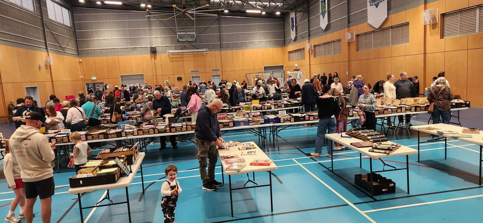 Families and local residents browsing donated books at the Lions book fair
